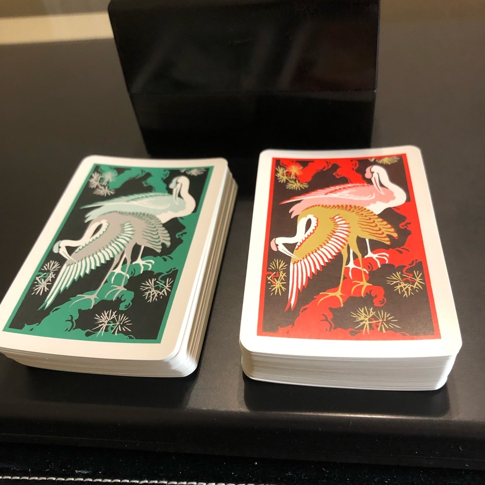 FLAMINGO KEM CARD SET: Each deck contains the 52 cards. No Jokers. Bend as shown